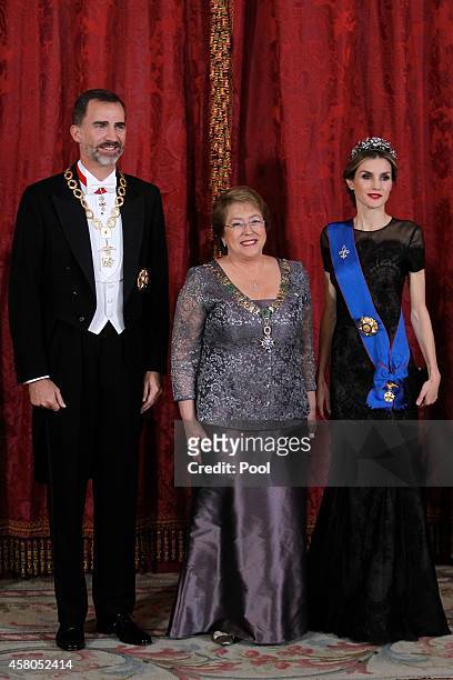 King Felipe VI of Spain and Queen Letizia of Spain receive Chilean President Michelle Bachelet for a Gala dinner at the Royal Palace on October 29,...