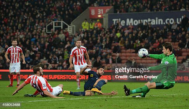Graziano Pelle of Southampton scores his team's 3rd goal past Asmir Begovic of Stoke City during the Capital One Cup Fourth Round match between Stoke...