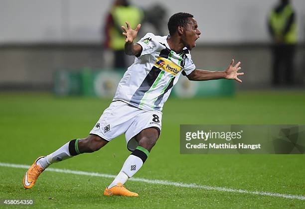 Ibrahim Traore of Gladbach celebrates after his team mate Thorgan Hazard of Gladbach scored the first goal during the DFB cup second round match...