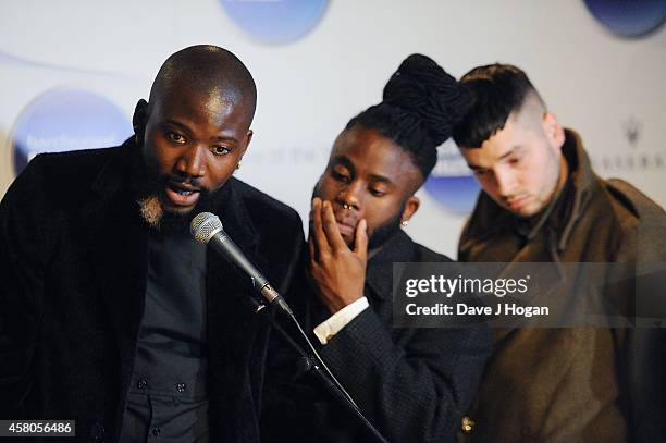 Winners of the Barclaycard Mercury Prize Alloysious Massaquoi, 'G' Hastings and Kayus Bankole of Young Fathers pose in the winners room at the...