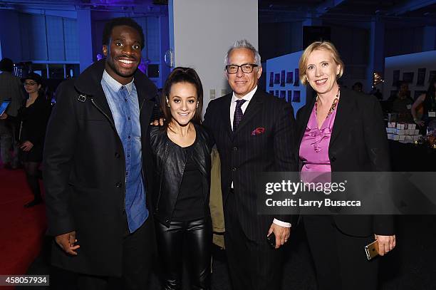 Professional football player Prince Amukamara, Pilar Davis, chef Geoffrey Zakarian, and Executive Director of City Harvest Jilly Stephens attend City...