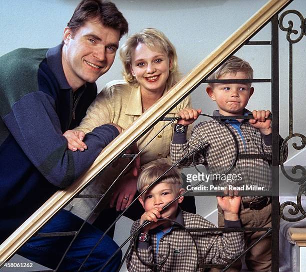 Portrait of Portland Trail Blazers Arvydas Sabonis casual with his family wife Ingrida and sons Zygimantas and Tautvydas during photo shoot at home...