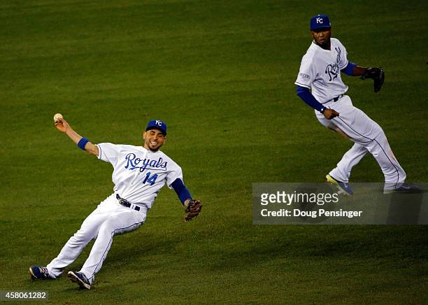 Omar Infante of the Kansas City Royals tries to make a play in the fourth inning against the San Francisco Giants during Game Seven of the 2014 World...