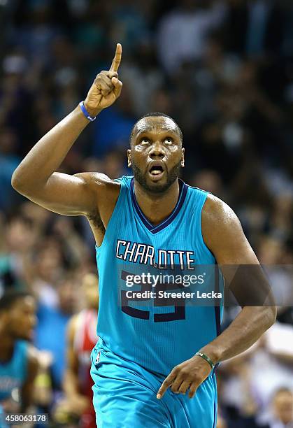 Al Jefferson of the Charlotte Hornets reacts after a shot against the Milwaukee Bucks during their game at Time Warner Cable Arena on October 29,...