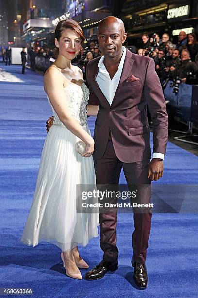 David Gyasi and Emma Gyasi attend the European Premiere of "Interstellar" at the Odeon Leicester Square on October 29, 2014 in London, England.