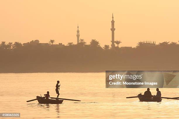 fishermen on nile river in luxor, egypt - nile delta stock pictures, royalty-free photos & images