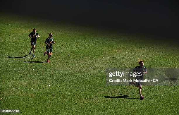 Players run during an Australian Southern Stars training session at Sydney University on October 30, 2014 in Sydney, Australia.