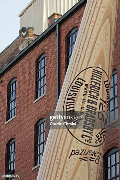 louisville slugger bat leaning against the museum - slugger stock pictures, royalty-free photos & images