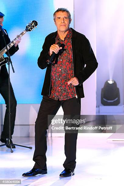 Singer Julien Clerc performs and presents his album 'Partout la musique vient' during the 'Vivement Dimanche' French TV Show. Held at Pavillon...