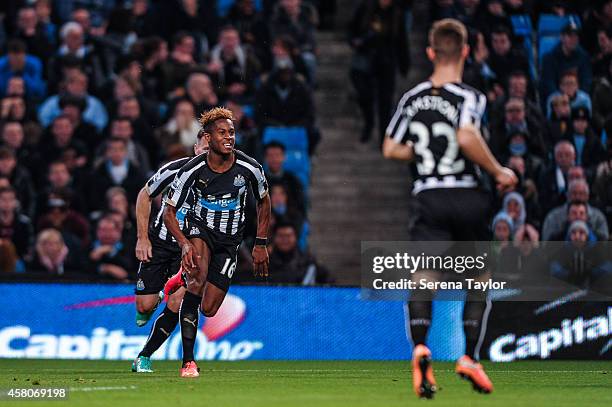 Rolando Aarons celebrates after scoring the opening goal during the Capital One Cup Fourth Round match between Manchester City and Newcastle United...