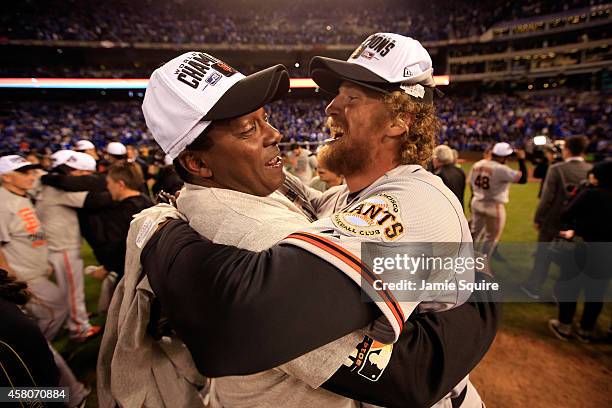 Hunter Pence of the San Francisco Giants celebrates on the field after defeating the the Kansas City Royals 3-2 to win Game Seven of the 2014 World...