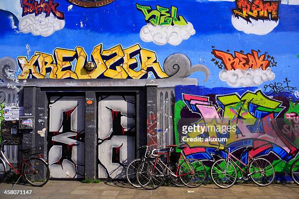 graffiti at kreuzberg berlin germany - berlin graffiti stock pictures, royalty-free photos & images