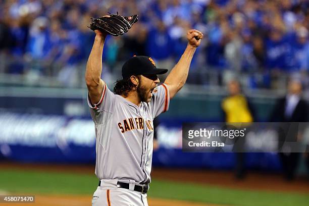 Madison Bumgarner of the San Francisco Giants celebrates after defeating the Kansas City Royals to win Game Seven of the 2014 World Series by a score...