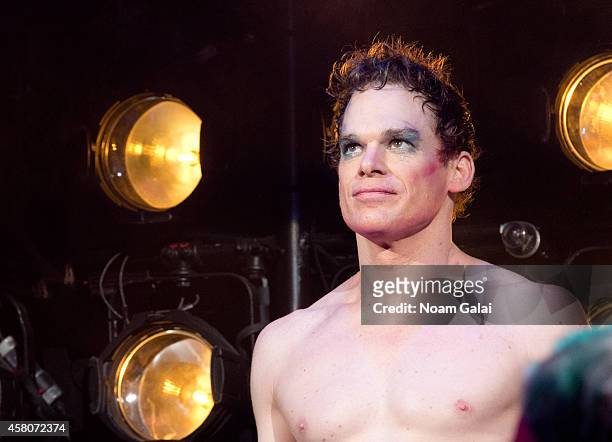 Michael C. Hall performs on stage during the curtain call of "Hedwig And The Angry Inch" at Belasco Theatre on October 29, 2014 in New York City.
