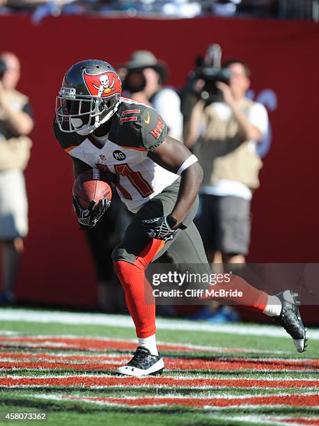 Kick returner Trindon Holliday runs a kick out of the endzone against the Minnesota Vikings at Raymond James Stadium on October 26, 2014 in Tampa,...