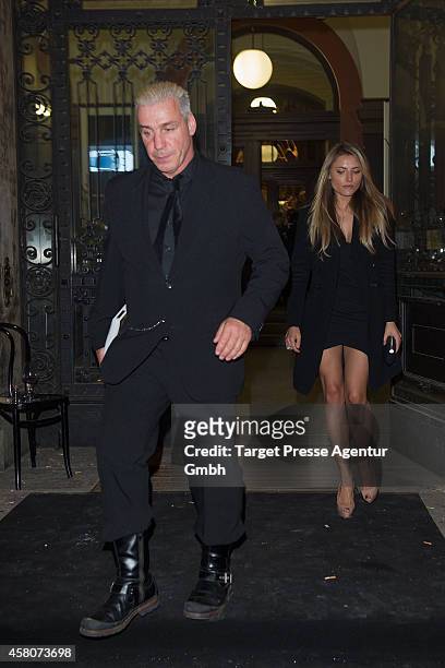 Till Lindemann of the band Rammstein and Sophia Thomalla leave the 10th anniversary celebration of the Zoo Magazine at Naturkundemuseum on October...
