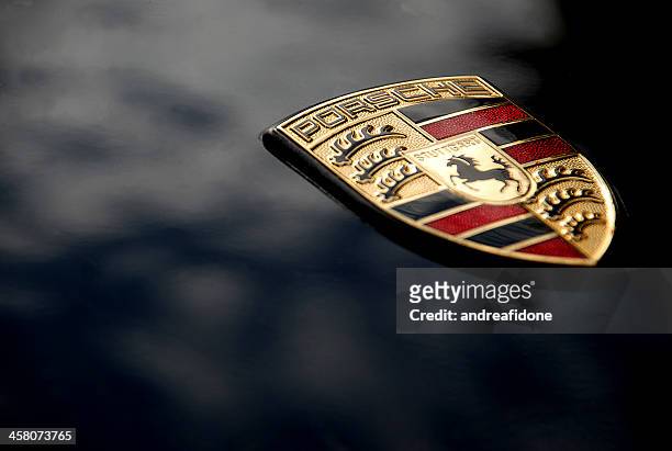 porsche logo on black, macro - porsche 911 stock pictures, royalty-free photos & images