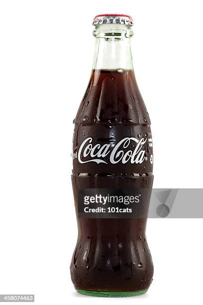 classical coca-cola bottle - cola bottle stock pictures, royalty-free photos & images