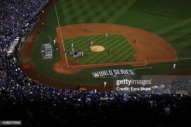 The San Francisco Giants celebrate after defeating the Kansas City Royals to win Game Seven of the 2014 World Series by a score of 3-2 at Kauffman...