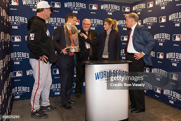 Manager Bruce Bochy, President and CEO Larry Baer and General Manager Brian Sabean of the San Francisco Giants are interviewed by Erin Andrews of Fox...