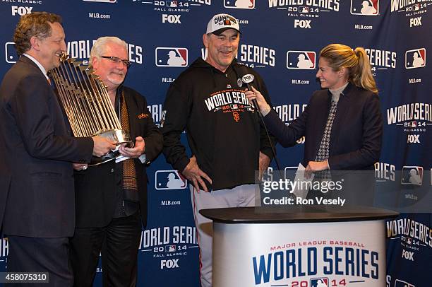 Erin Andrews interviews San Francisco Giants manager Bruce Bochy after they defeated the Kansas City Royals in Game 7 of the 2014 World Series on...