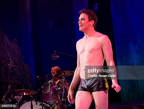 Michael C. Hall performs on stage during the curtain call of "Hedwig And The Angry Inch" at Belasco Theatre on October 29, 2014 in New York City.