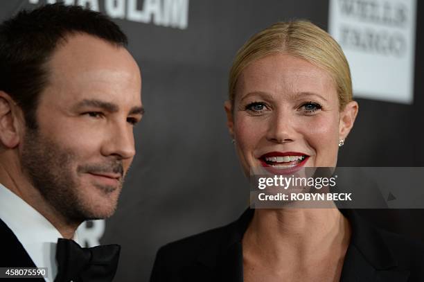 Designer Tom Ford and actress Gwyneth Paltrow attend amfARs fifth annual Inspiration Gala in Los Angeles, October 29, 2014 at Milk Studios in...