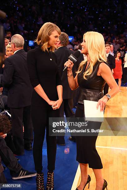 Musician Taylor Swift is interviewed by reporter Jill Martin during a game between the New York Knicks and the Chicago Bulls at Madison Square Garden...