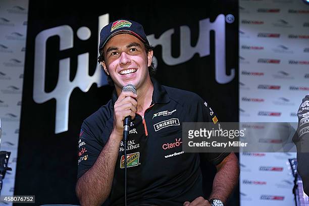 Sergio "Checo" Perez participates in the F1 Fan's Forum at Gibson Austin Showroom on October 29, 2014 in Austin, Texas.