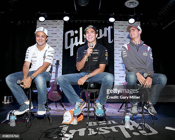 Felipe Massa, Sergio "Checo" Perez and Esteban Gutierez participate in the F1 Fan's Forum at Gibson Austin Showroom on October 29, 2014 in Austin,...