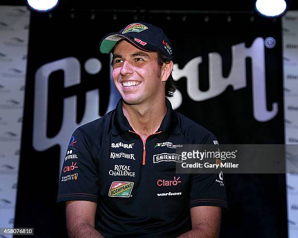 Sergio "Checo" Perez participates in the F1 Fan's Forum at Gibson Austin Showroom on October 29, 2014 in Austin, Texas.