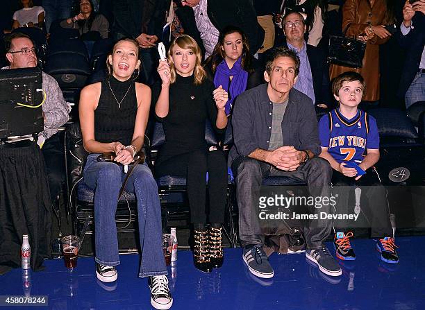 Karlie Kloss, Taylor Swift, Ben Stiller and son Quinlin Stiller attend the Chicago Bulls vs New York Knicks game at Madison Square Garden on October...