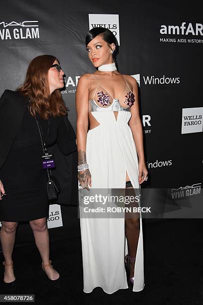 Singer Rihanna attends amfARs fifth annual Inspiration Gala in Los Angeles, October 29, 2014 at Milk Studios in Hollywood, California. AFP PHOTO /...