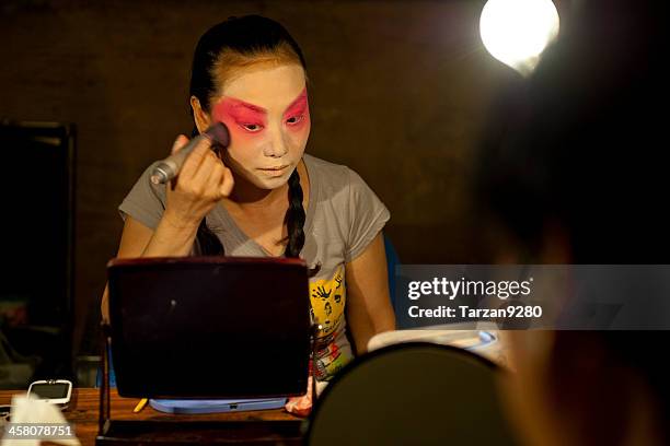 actress making up at back stage - peking opera stock pictures, royalty-free photos & images
