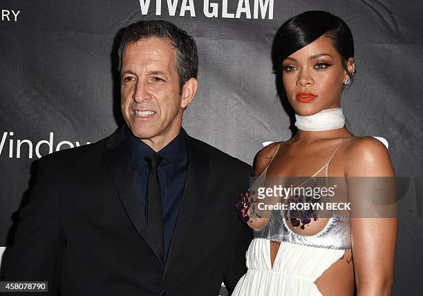 Singer Rihanna and designer Kenneth Cole attend amfARs fifth annual Inspiration Gala in Los Angeles, October 29, 2014 at Milk Studios in Hollywood,...
