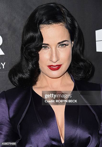 Performer Dita Von Teese attends amfARs fifth annual Inspiration Gala in Los Angeles, October 29, 2014 at Milk Studios in Hollywood, California. AFP...