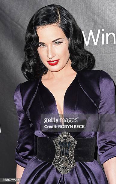 Performer Dita Von Teese attends amfARs fifth annual Inspiration Gala in Los Angeles, October 29, 2014 at Milk Studios in Hollywood, California. AFP...
