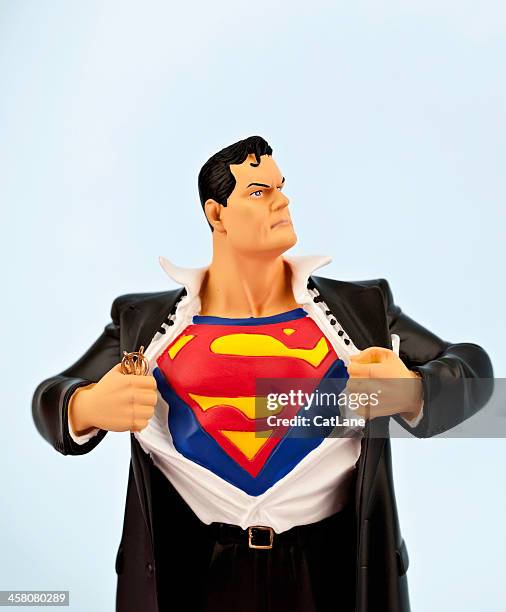 clark kent wird superman - superman stock-fotos und bilder