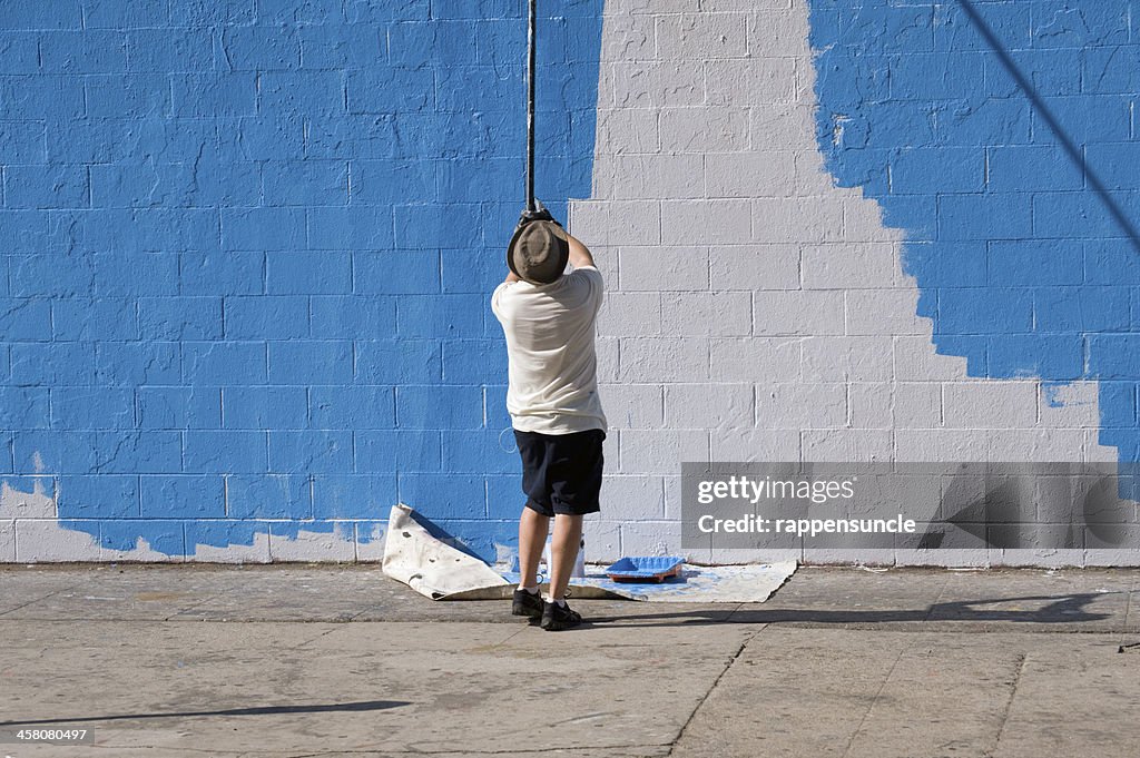 Painting the wall blue