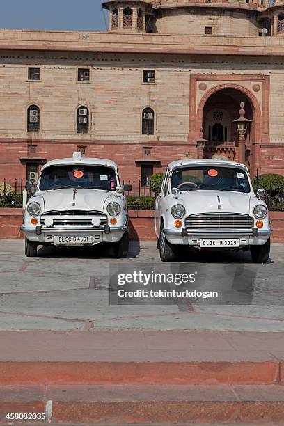 traditional official government car called ambasador at new delhi india - ambassador car stock pictures, royalty-free photos & images