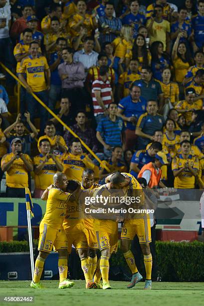 Damian Alvarez of Tigres celebrates after scoring his team's firs goal during a semifinal match between Tigres UANL and Santos Laguna as part of Copa...