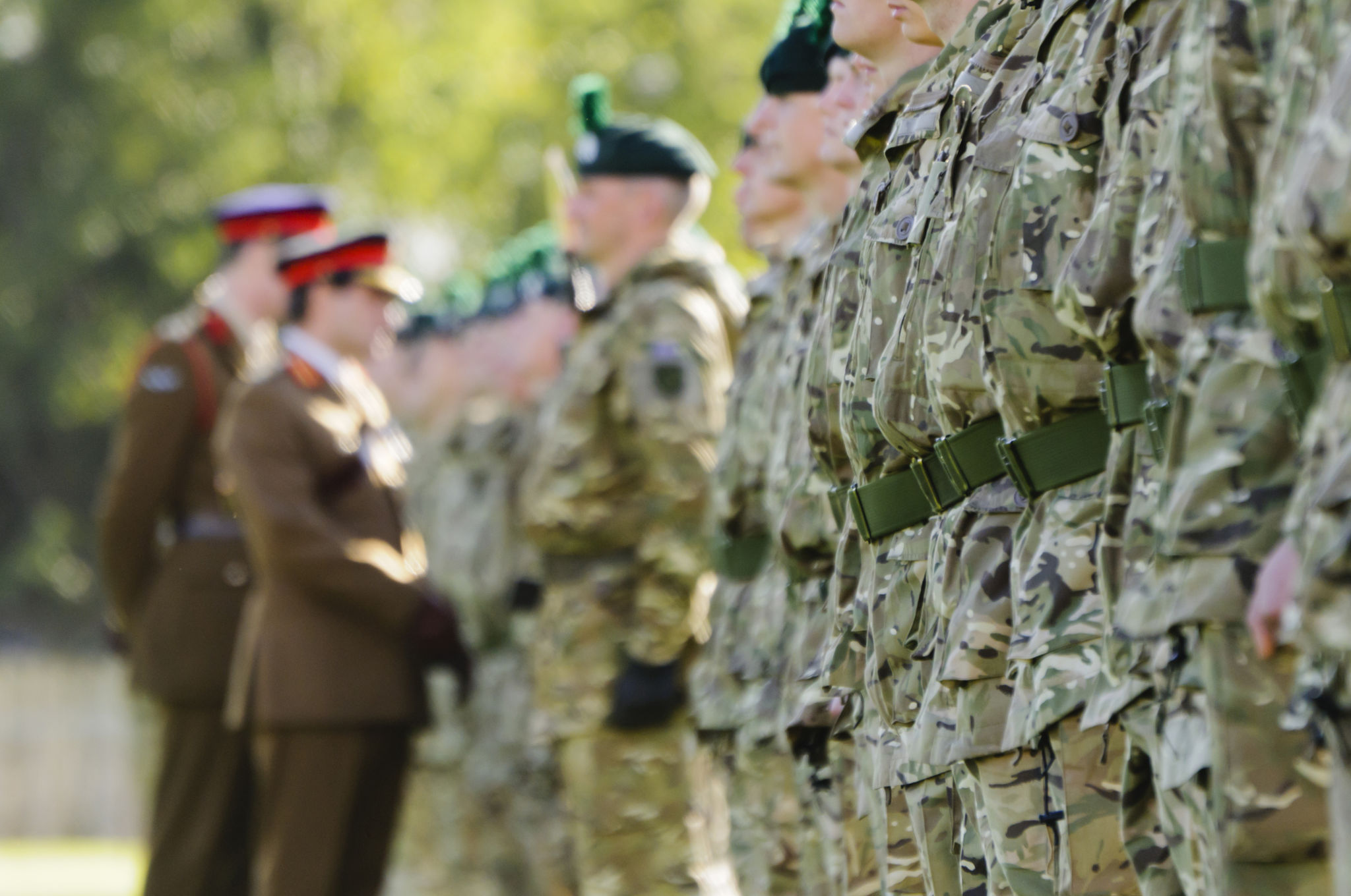 Army generals inspect a line of soldiers Army generals inspect a line of soldiers