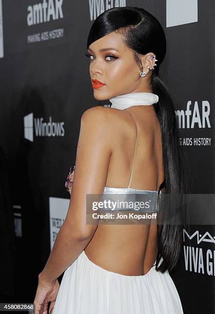 Singer Rihanna arrives at the 2014 amfAR LA Inspiration Gala at Milk Studios on October 29, 2014 in Hollywood, California.