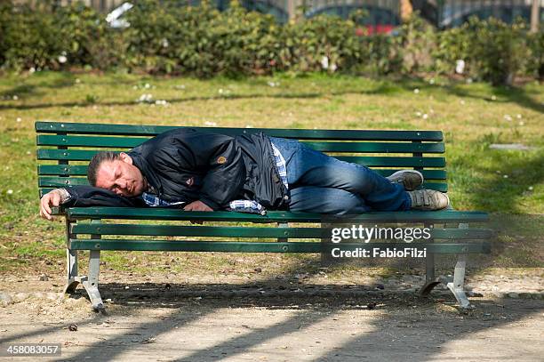 homeless in milano - fabio filzi stock pictures, royalty-free photos & images