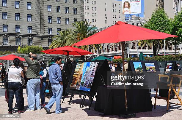 people at art show in san francisco - art show stock pictures, royalty-free photos & images