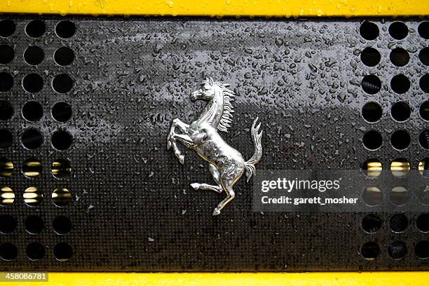 wet ferrari logo - porsche club stock pictures, royalty-free photos & images