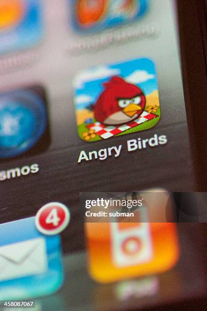 angry birds icon on an iphone - angry birds namngivna videospel bildbanksfoton och bilder