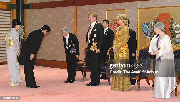 Emperor Akihito , King Willem-Alexander of the Netherlands , Queen Maxima of the Netherlands and Empress Michiko welcome Japanese Prime Minister...
