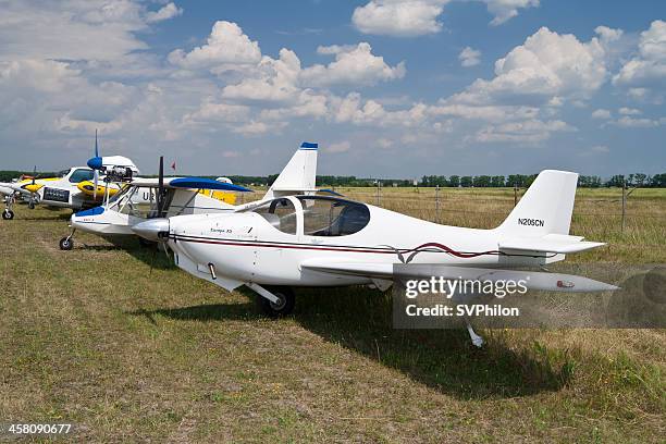 airplane europa xs monowheel  parked on the airfield of zhytomyr. - monowheel stockfoto's en -beelden