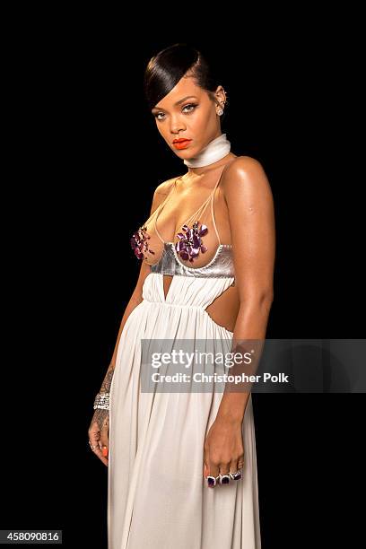 Singer Rihanna poses for photos backstage at Milk Studios on October 29, 2014 in Hollywood, California.